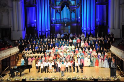 VoCo singers together on stage in 2025